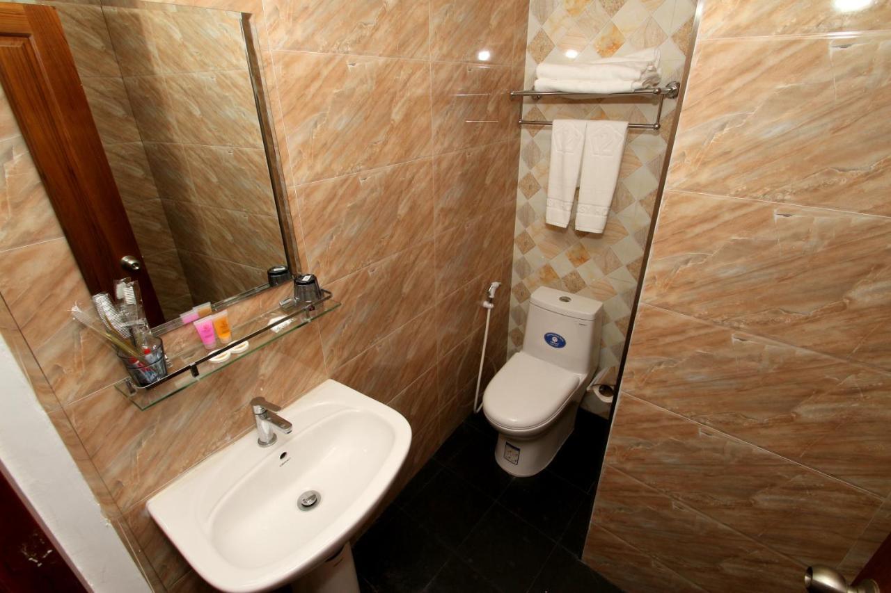 Gemsy Hotel Yangón Habitación foto